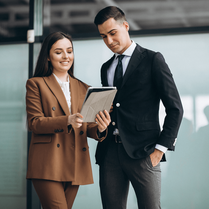 male-female-business-people-working-tablet-office